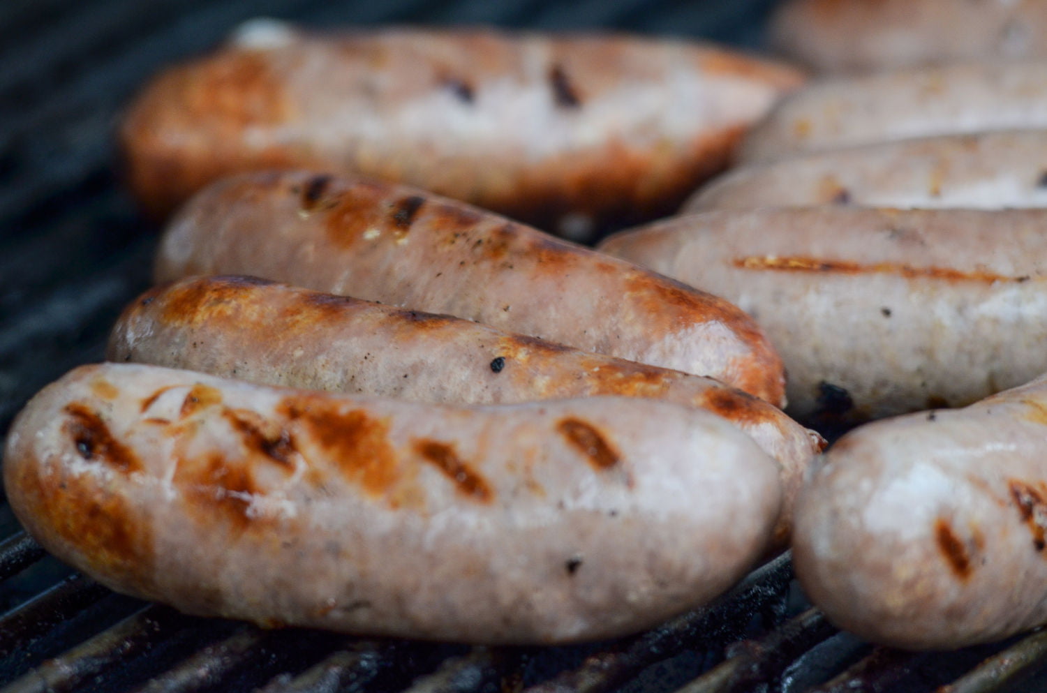 Sausages cooking.