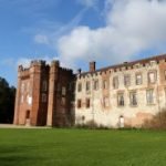 Front of Castle with grass surrounding.