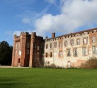 Front of Castle with grass surrounding.