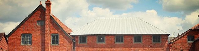 Roof of a red brick building.