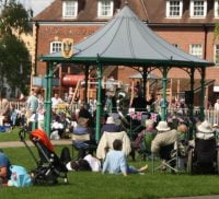 Crowd of people and bandstand