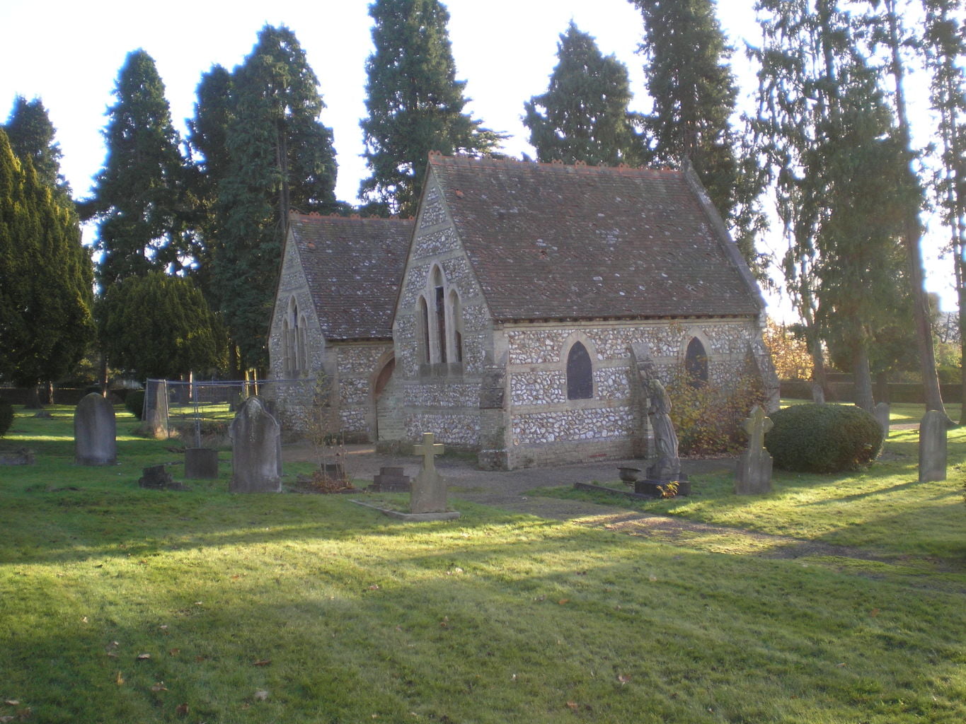 Stone chapels in graveyard.