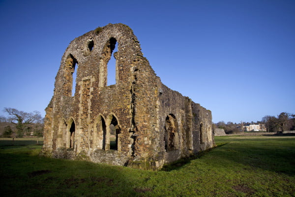 Stone ruins with grass surroundings.