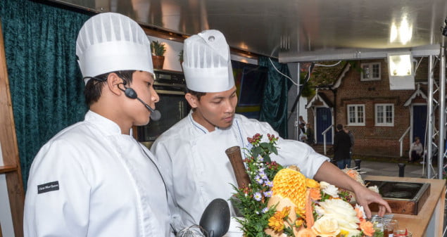 Chefs preparing food at the Food Festival. © David Fisher 2013