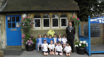 School children, Mayor, school, hanging baskets.