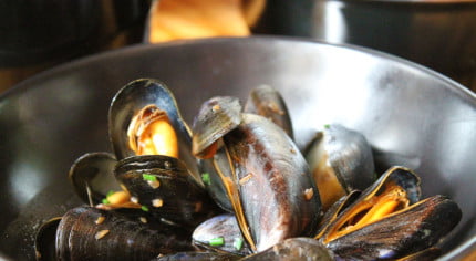 Fresh mussels cooking in a pan. © The Wheatsheaf Pub & Grill