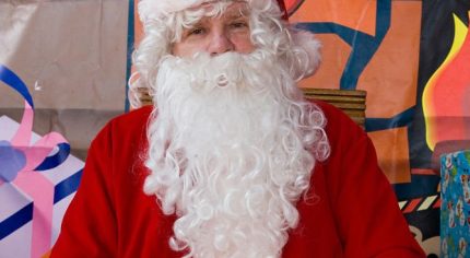 Male dressed as Father Christmas