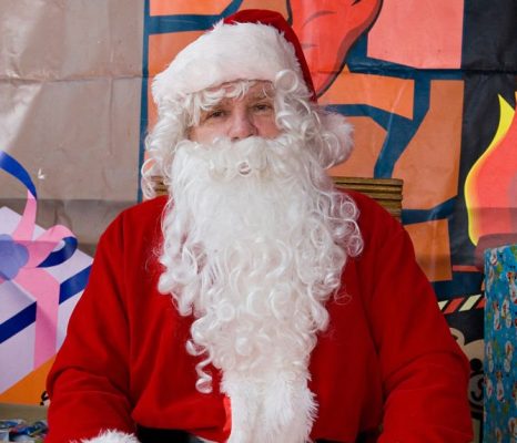 Male dressed as Father Christmas