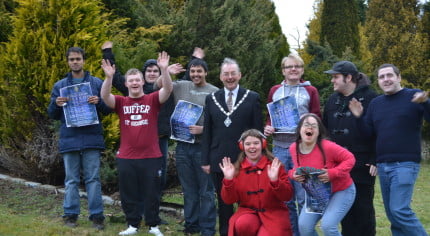 group of young people and the Mayor