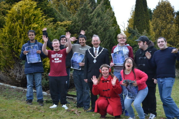 group of young people and the Mayor