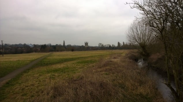 Meadows and river on right