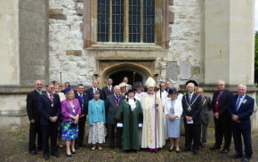 group of people outside church.