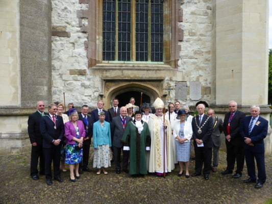 group of people outside church.