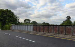 Railway bridge, partly painted.