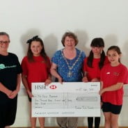 The Mayor presents a cheque to young dancers.