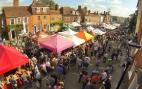 Aerial view of a crowded street market.