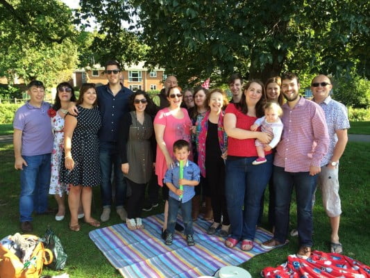 group of people in the meadow.