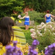 Young people dancing in a garden