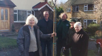 The photo shows Jane Marley (right) with two of her neighbours, Cllr Stephen Hill and Robin Cooper from Farnham Town Council.