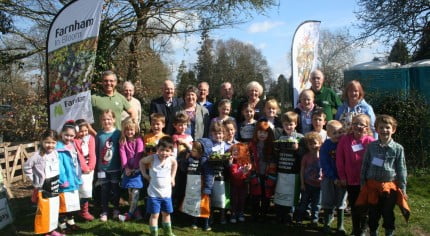 A group of children and adults outside