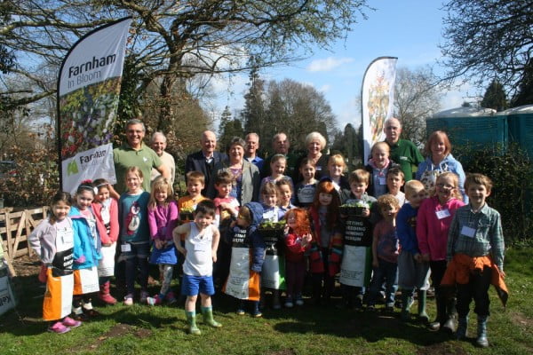 A group of children and adults outside