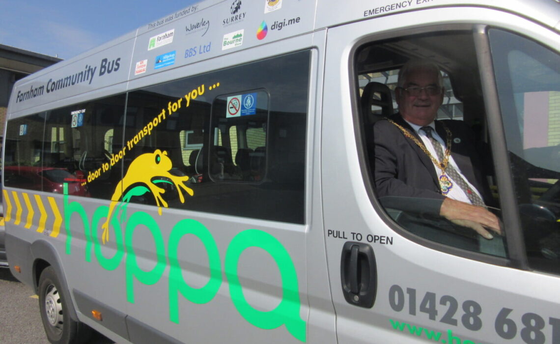 Mayor in driver's seat of a hoppa bus