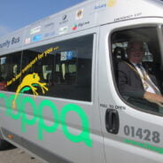 Mayor in driver's seat of a hoppa bus
