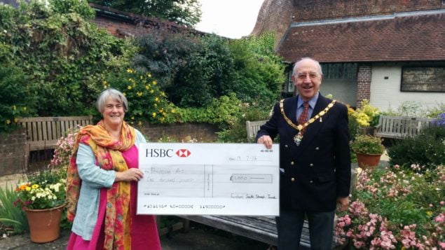 The Mayor of Farnham, Cllr John Ward presents a cheque to Jo Aylwin.