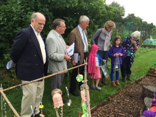 Judges visit an allotment.