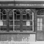 Black and white photo of a shop