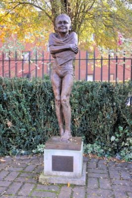 Statue of a shivering boy.