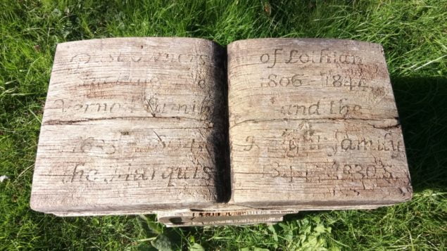 Wooden stool carved to look like a book