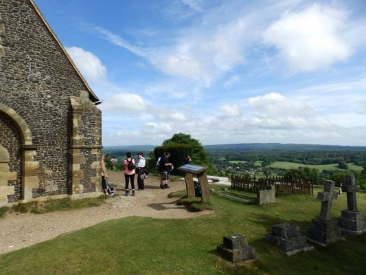 Chapel and distant views over countryside.