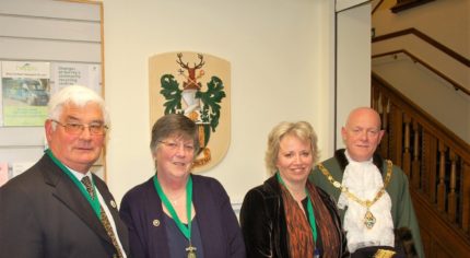 Caption: Cllr David Attfield, Deputy Mayor, Anne Attfield, Cllr Julia Potts, Mayor’s Consort and Cllr Mike Hodge, Mayor of Farnham.