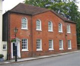 Red brick detached building.