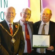 Five males including the Mayor with certificates.