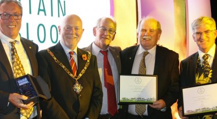 Five males including the Mayor with certificates.