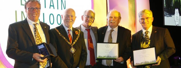 Five males including the Mayor with certificates.