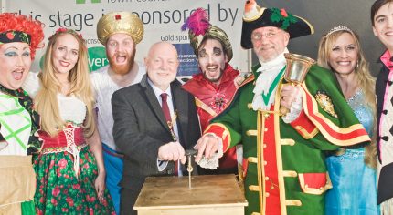 Mayor, town crier and pantomime characters.