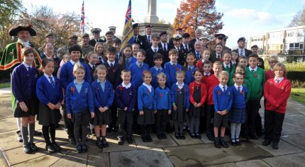 School children at war memorial