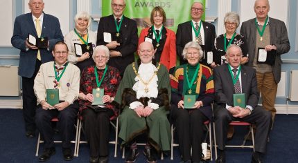 Mayor with group of 11 winners of Services to Farnham awards.