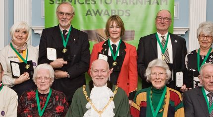 Mayor with group of 11 winners of Services to Farnham awards.