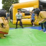 Children in inflatable costumes.