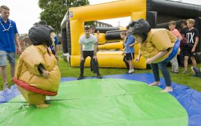 Children in inflatable costumes.