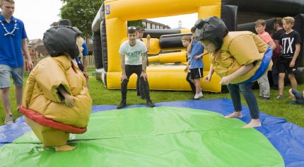 Children in inflatable costumes.