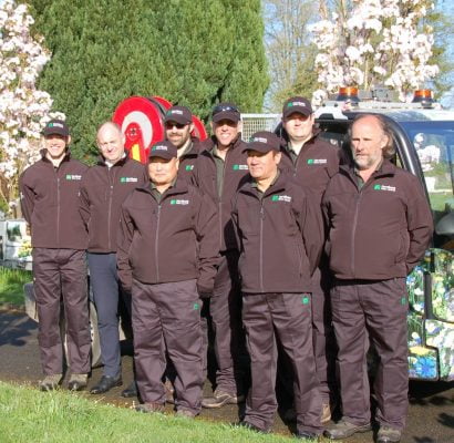 Group males in black uniforms.