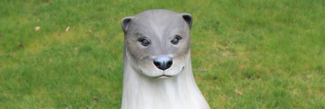 Head of an otter sculpture.