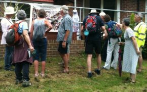 Group of walkers looking at a banner.
