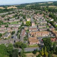 Aerial photo showing buildings and trees.