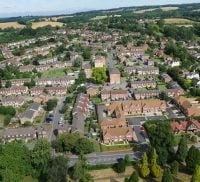 Aerial photo showing buildings and trees.